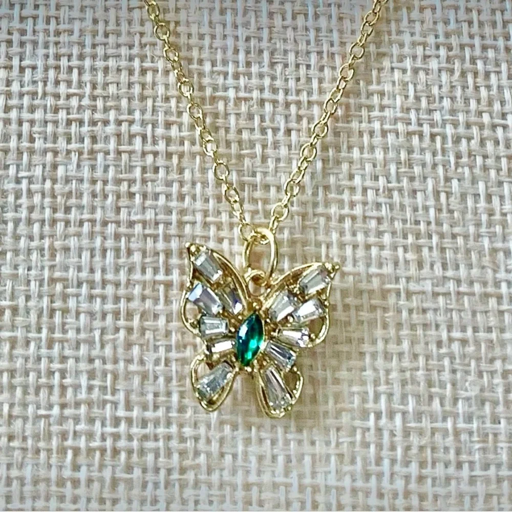 Elegant Gold Butterfly Pendant Necklace with green crystals NWT.